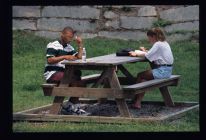 Students studying at picnic table